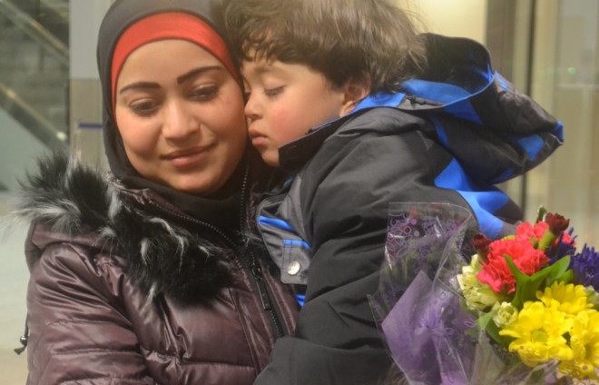 537158_web_gw.n.p.Syrianarrival1.dec30_col